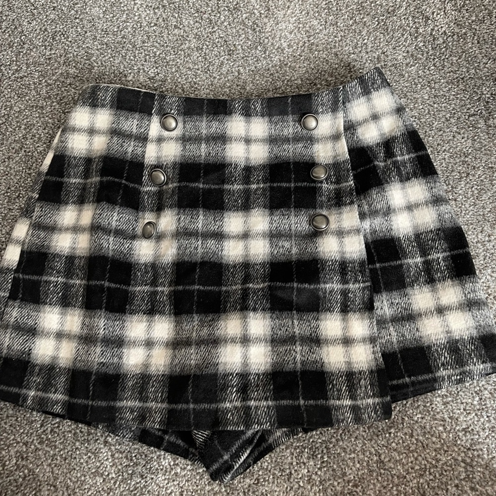 Plaid skort, brand new. WITH TAGS